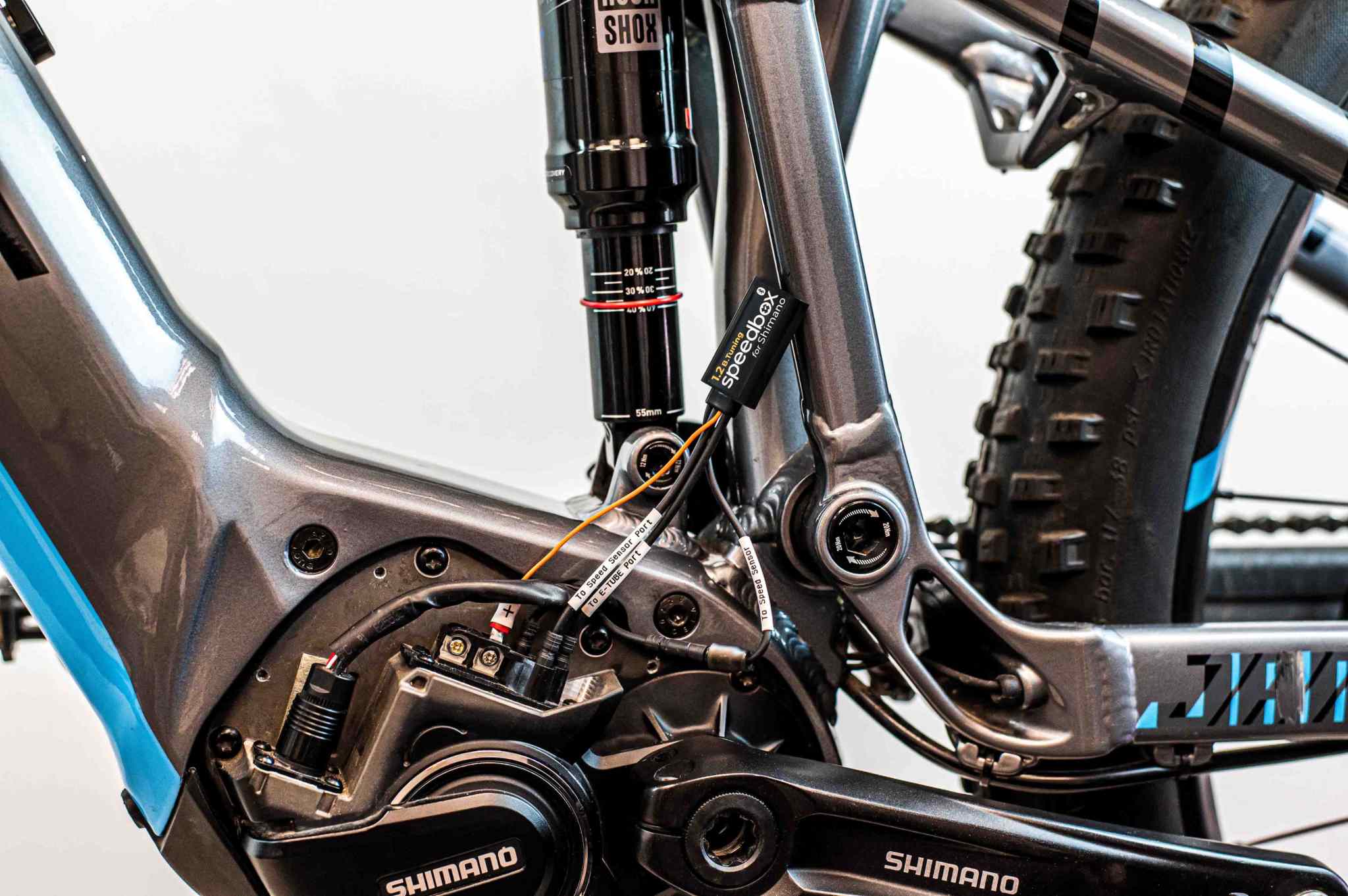 SpeedBox 1.2 B.Tuning module installed on Shimano E8000 electric bike motor for tuning and speed limit removal